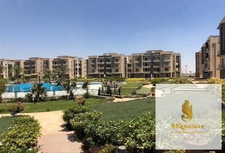 For sale at an attractive price: a ground-floor apartment with a distinctive garden view in Galleria Moon Valley, Fifth Settlement.