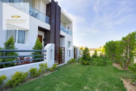 Villa for sale with an open view of the golf course, featuring a unique layout, consisting of Ground + First + Roof
