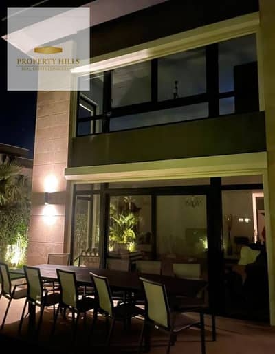 Corner Villa finished with a 25% discount from Hassan Allam in the Compound Villas only view landscape at the top community in front of the American University