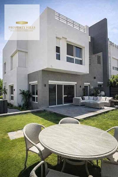 At the old price, a villa with down payment (1,353,000) from the prestigious and distinguished compound, only villas, view water, future, and smart club has coworking space, gym, track, clubhouse