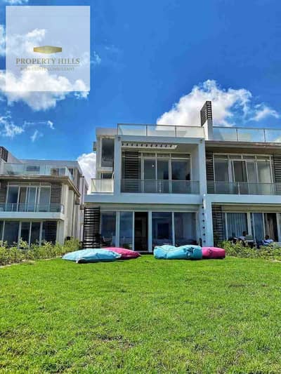 Fully finished chalet with garden for sale in marsa baghush and first row Panoramic Sea & Lagoon View ready for viewing  Details:  Unit Type: chalet  Bedrooms: 2  Built-up Area: 120m² + 12sqm garden  Direct panoramic view of the sea and lagoon  Ready for