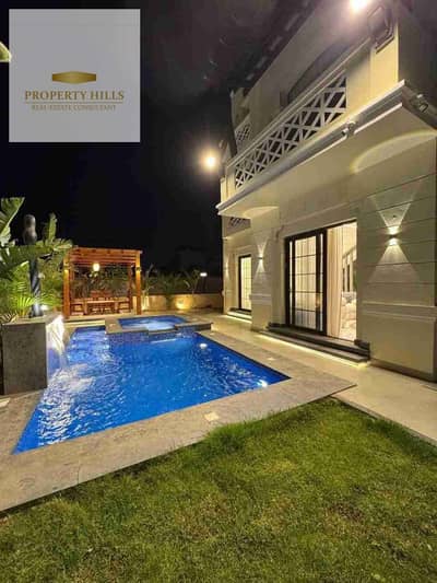 Villa for Sale behind al ahly club with private pool and elevator and best price  Unit Type: townhouse  Area: 230 sqm  Parking: Private parking space   Compound Features:  Prime location just 3 minutes from Al Ahly Club  Modern designs with premium finish