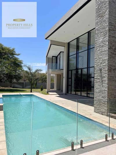 Villa fully finished close to American university 5th settlement patio town