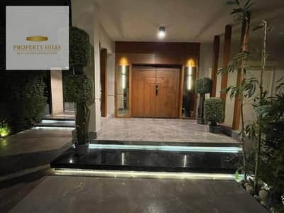 A distinctive villa for sale with a spacious garden, fully finished to an ultra-super-lux standard.