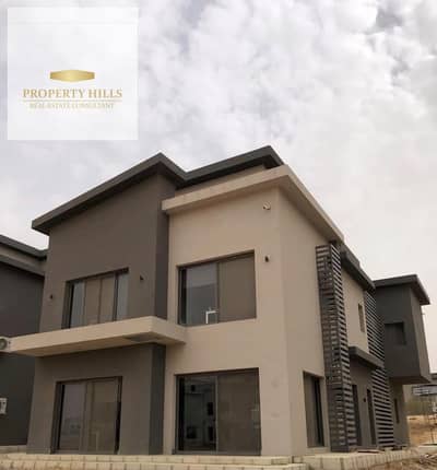 Villa for sale with a lake view at the lowest price in Fifth Settlement