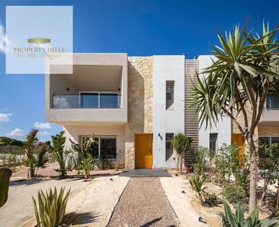 Chalet for sale overlooking the sea with a private garden in the North Coast