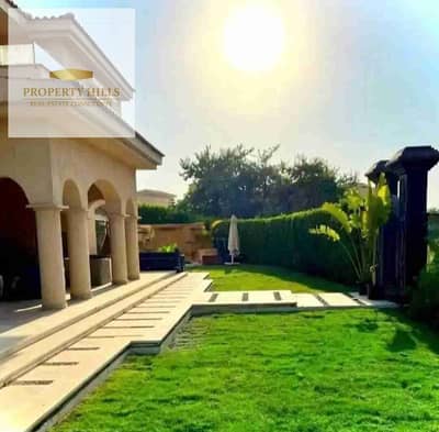 Corner villa with a private swimming pool, ready for immediate delivery, located on Suez Road near La Vista and Hassan Allam.