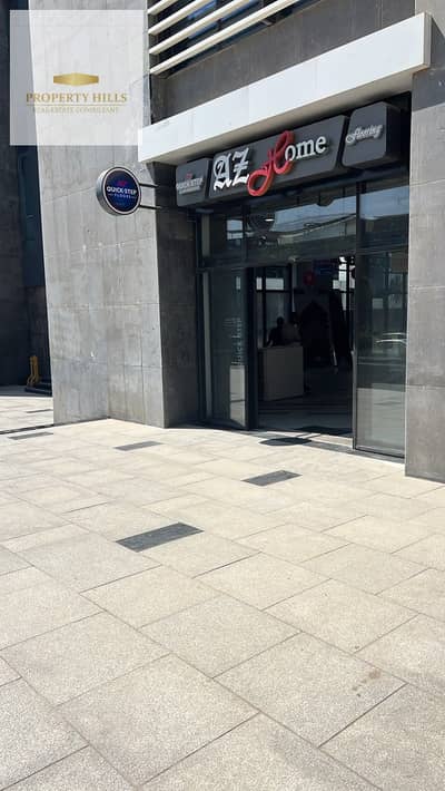 Shop for Sale, Already Rented to a Brand, Generating a Monthly Return and Profit of EGP 292,000, Ready for Delivery in Golden Square, Fifth Settlement, on 90th Street.