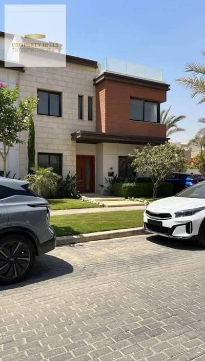Standalone villa at a discounted price in New Cairo's Golden Square, directly on North 90 Street, close to Clubs Street, Mountain View, and Mivida.