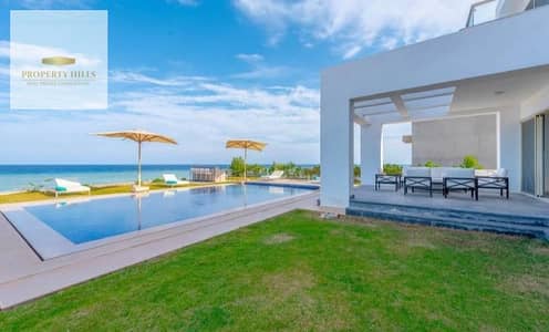 351 sqm Standalone Villa, immediate delivery, with a private pool, first row directly on the sea, fully finished and turnkey, fully furnished with ACs in North Coast – Marina Alamein.