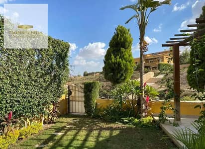 A distinctive villa with an open view in the Fifth Settlement, near Mivida, 90th Street, the American University, and Mohamed Naguib Axis.