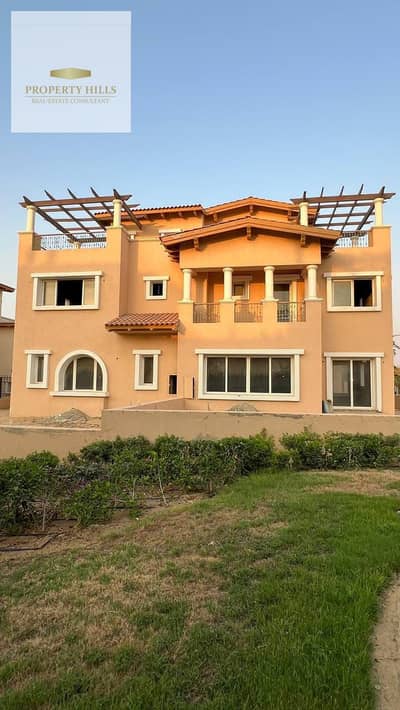A distinguished 370 sqm standalone villa with an open view in a prime location in the Fifth Settlement, near Mivida, 90th Street, the American University, and Mountain View.