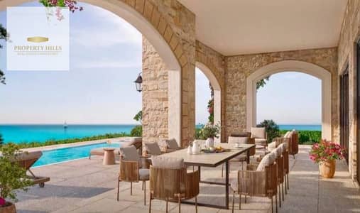 VIP Standalone Villa, 604 sqm,Sea View, located in a distinctive Emirati village within the Ras El Hekma Triangle, fully finished with air conditioning and a kitchen, near La Vista, Fouka Bay, and Mountain View.