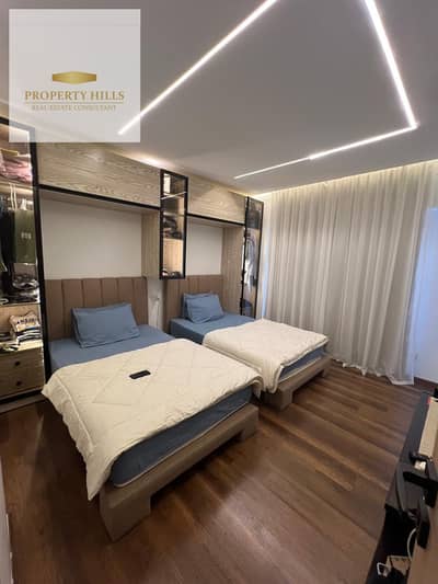 Fully finished apartment with a 200,000 down payment and installments up to 15 years Direct view of the lake and landscaped area Fully serviced compou Fully finished apartment with a 200,000 down payment and installments up to 15 years Direct view of the lake and landscaped area Fully serviced compou
