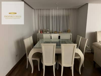 Fully finished apartment with a 200,000 down payment and installments up to 15 years Direct view of the lake and landscaped area Fully serviced compou