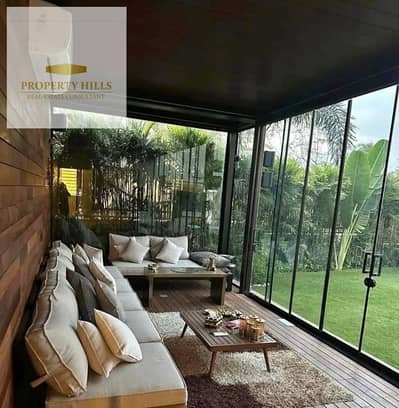 A fully finished, ready-to-move-in 600 sqm standalone villa in La Vista, featuring a view of the pool and landscaped gardens.