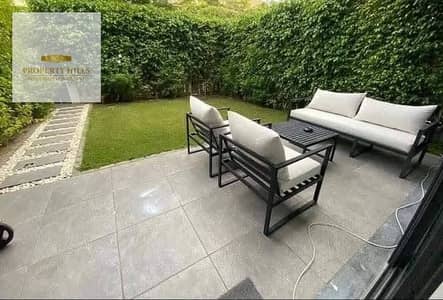The villa is directly on the Suez Road, a wall in a wall with La Vista El Patio Soula and the Springs project, in front of Madinaty 2
