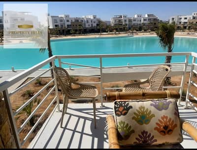 FOR SALE fully finished chalet with AC'S and kitchen cabinet's , very prime location lagoon view at swan lake elgouna with installments over 6 years!!