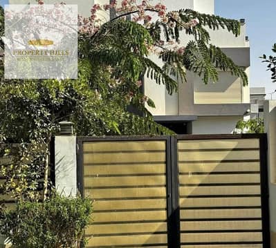 Twin house villa in the heart of Sheikh Zayed with a spacious northern roof in Elora in front of Emmar and next to Sodic