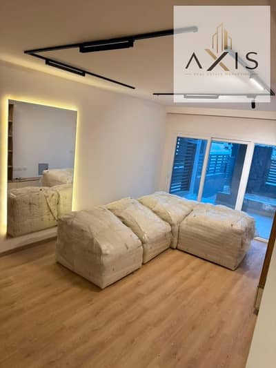 Apartment with a Private Garden for rent at an amazing price, 130 SQM, Garden 100 SQM in Grand Heights Compound, October, el sheikh zayed