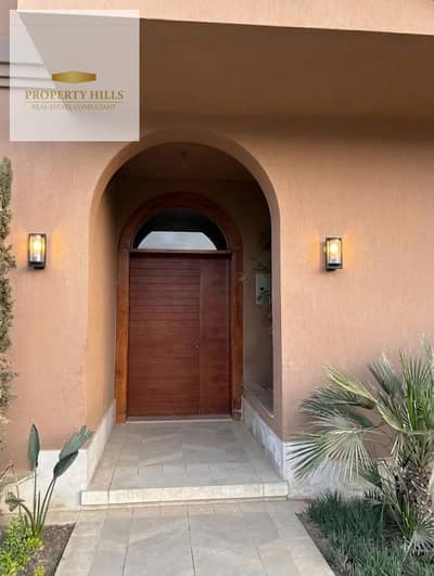 Villa Town Corner with a distinctive landscape view in Village West, two minutes from Hyper One and Arkan Sheikh Zayed