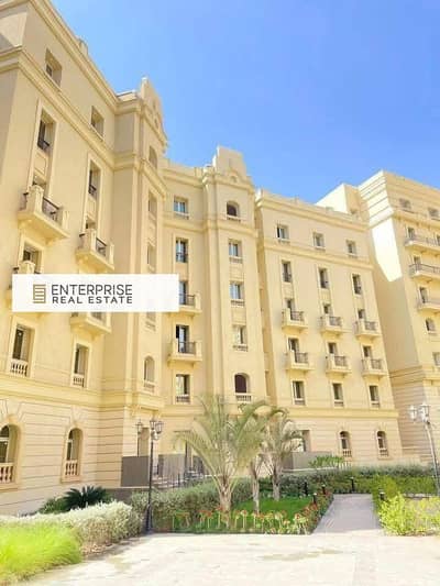 Fully finished apartment with ACs, key-ready, garden view, in New Garden City Compound, one of New Cairo’s finest compounds, near the New Capital