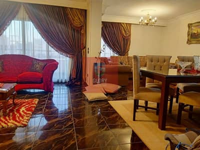 Apartment for sale in Nasr City - large area and exceptional location - distinctive layout - elevator - share in the garage - complete details in the description