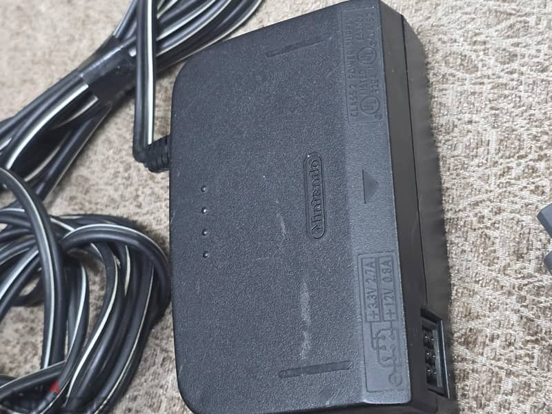 2 power Nintendo 64 + Av cable 3