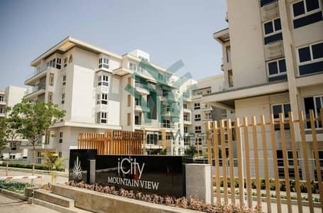 Apartment for sale in Mountain View iCity, New Cairo—featuring a prime, quiet location and a distinctive view. The unit is North-facing and finished -