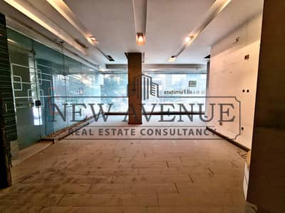 Retail 135 sqm for sale with very prime location Directly on Gameat El Dowal El Arabeya Street
