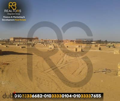 2.80-feddan plot of land for sale at the Dahshur Link—specifically at the intersection of the Dahshur Link and the Desert Road (Sheikh Zayed).