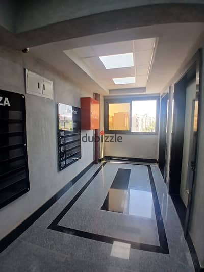 عيادة استلام فوري في مول A Plaza -  الشيخ زايد مساحة 39 متر بجانب      El Karma Residence