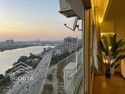 شقة للبيع في قلب كورنيش المعادي القاهرة وبجوار هيلتون المعادي reve du nile اول برج فندقي بعائد فوري Novara Developmen