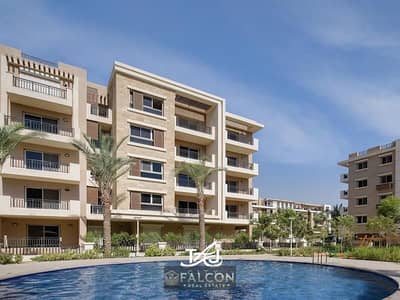 Earliest handover in Taj City at half price: Apartment with a roof terrace (102 sqm + roof) facing the airport – New Cairo.