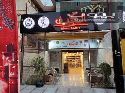 Shop for rent in Sheraton Airport, commercial market, 45 m, super lux finishing, suitable for cafes and equipment, prime location, and rent 30,000 EGP monthly