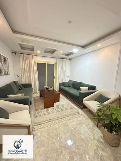 Furnished apartment for rent in Zahraa Al-Maadi, Al-Zahraa main street, distinguished and upscale location close to all restaurants and brands