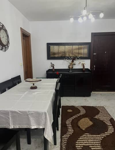 Furnished 97 sqm apartment for rent in B7 Madinaty, 4th floor, 2 bedrooms, 2 bathrooms, reception and kitchen, prime location