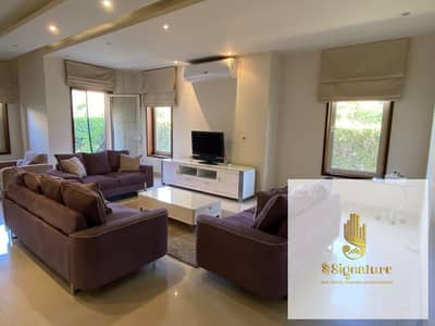 For rent (furnished): 180 sqm apartment with a 120 sqm garden, featuring 3 bedrooms. Located in West Arabella, Fifth Settlement; includes new, hotel-s