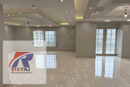 Apartment for sale in a prime location (230 sqm) featuring a garden view. Situated on a lively two-way street in the 6th District—between Al Ahly Club