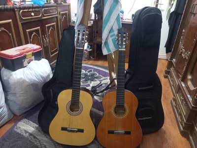 2 جيتار + 2 شنطة + مسند قدم للبيع