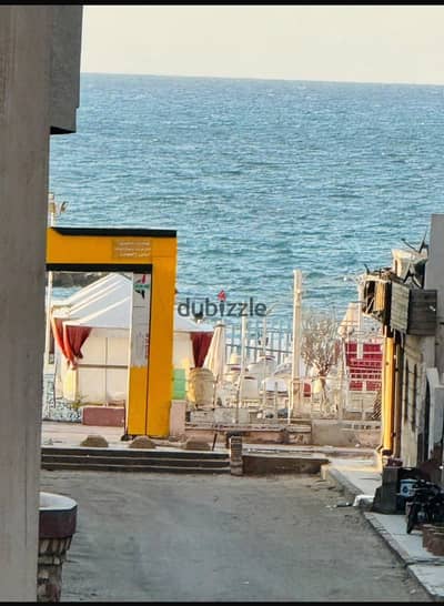 شقه للبيع في الكيلو 21 شاطئ النخيل بجوار الشارع الرئيسي مباشره خطوات للبحر والأسواق موقع سكنى ومصيفى رائع مسجلة كاملة المرافق