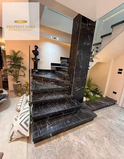 An exceptional villa for sale at half its original price in the prestigious Azar compound, featuring a flexible 10-year installment plan and a 45% discount for cash payments.