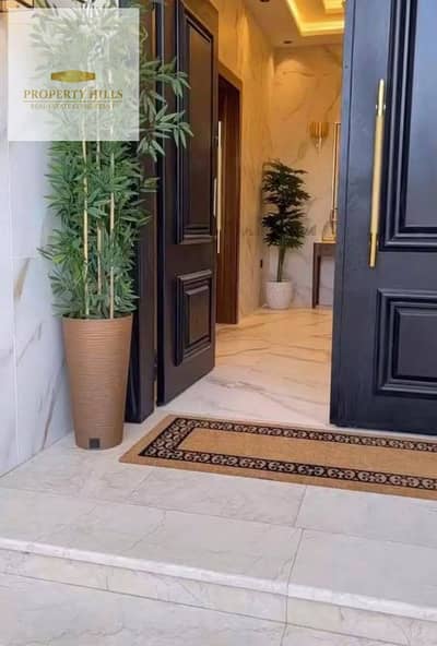 An exceptional villa for sale at half its original price in the prestigious Azar compound, featuring a flexible 10-year installment plan and a 45% discount for cash payments. An exceptional villa for sale at half its original price in the prestigious Azar compound, featuring a flexible 10-year installment plan and a 45% discount for cash payments.