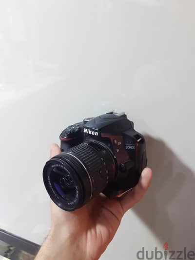 Nikon d3400 with kit lens 18-55, in a good case