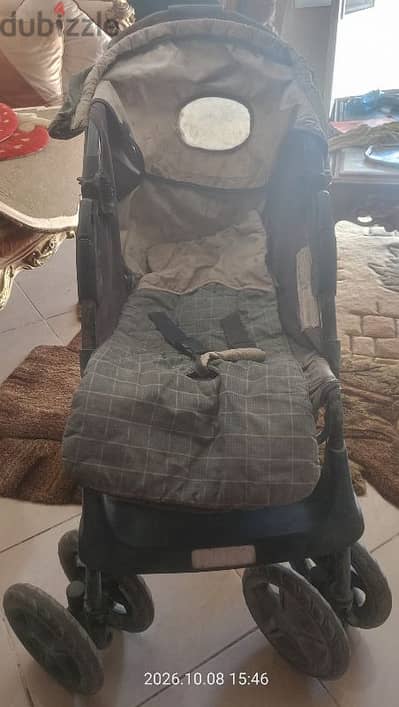 عربة أطفال بحالة جيدة