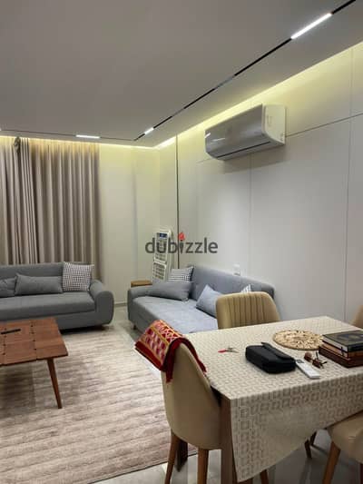 Furnished 92 sqm apartment for rent in Al Rehab; prime location near Services.