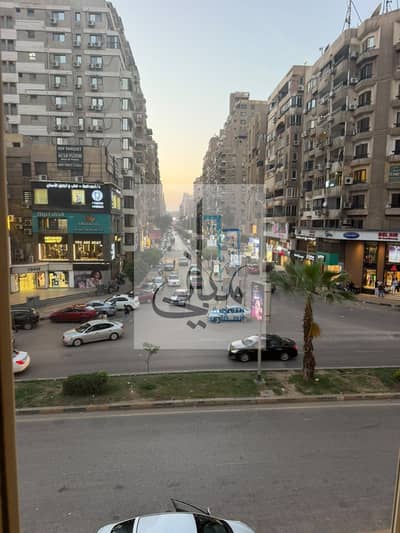 Apartment for rent in Mohandessin (Jazirat Al-Arab Street) – 150 sqm with a wonderful open view. Includes kitchen and air conditioning units.