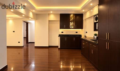 Apartment for rent in Tharwat, second floor, elevator, 90 m, two bedrooms, small reception, bathroom, and kitchen with cabinets, all utilities included