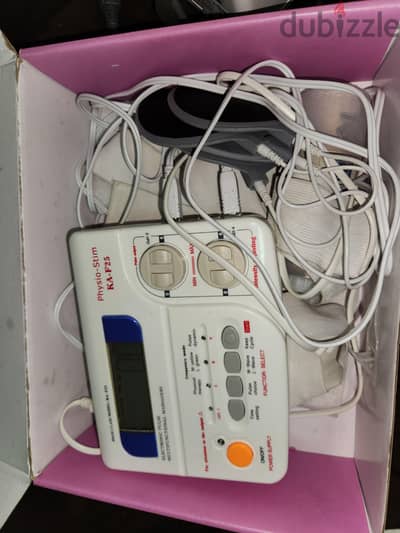 جهاز Physio-Stim KA-F25، وهو جهاز علاج طبيعي بالنبضات الكهربائية