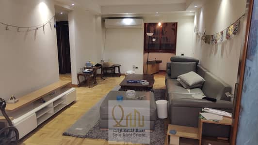250m flat for sale, fully furnished and equipped, in a prime location near Al-Masaha Square in Dokki